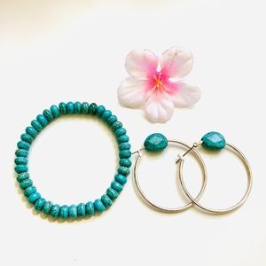 A nice turquoise bracelet  and  silver earrings